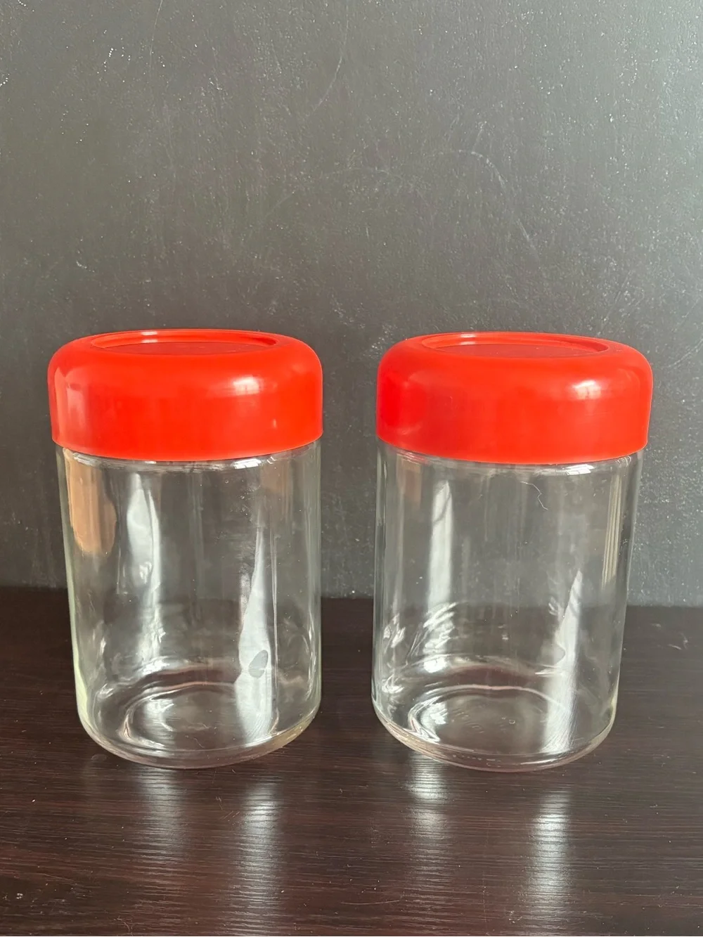 Massimo Vignelli Set of 2 Vintage Orange Glass Canisters.